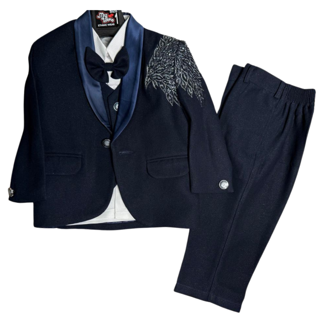Premium black tuxedo with elegant embroidery – perfect for your little gentleman’s grand occasions.