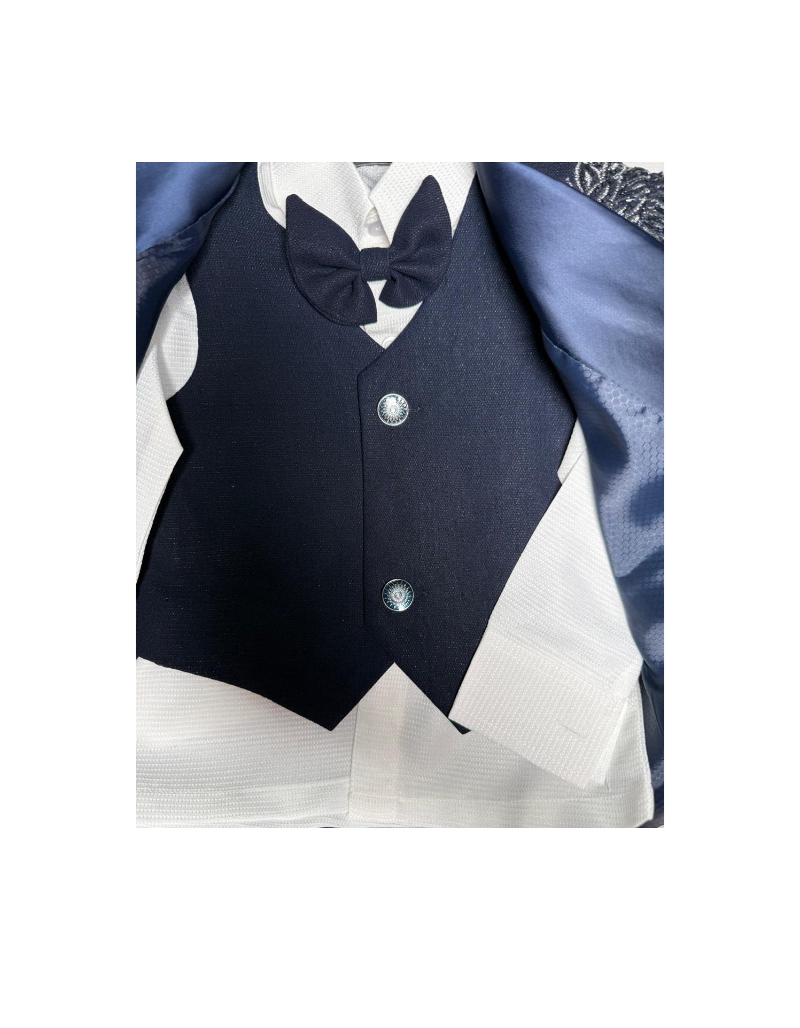 Premium black tuxedo with elegant embroidery – perfect for your little gentleman’s grand occasions.
