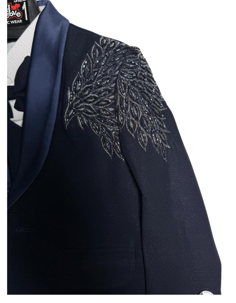Premium black tuxedo with elegant embroidery – perfect for your little gentleman’s grand occasions.