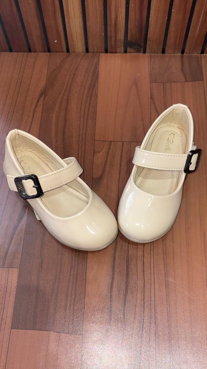 Classic Mary Jane design with buckle closure