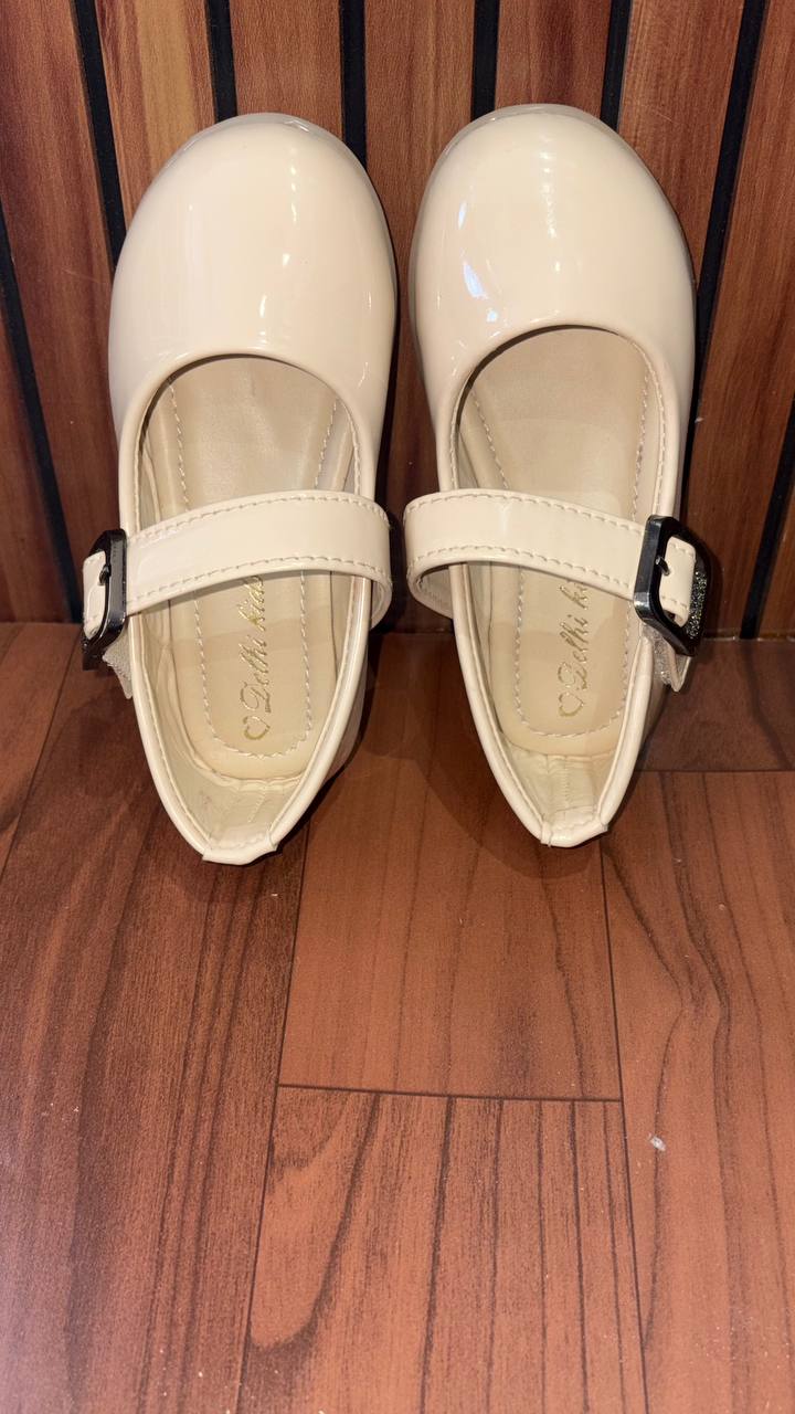 Classic Mary Jane design with buckle closure