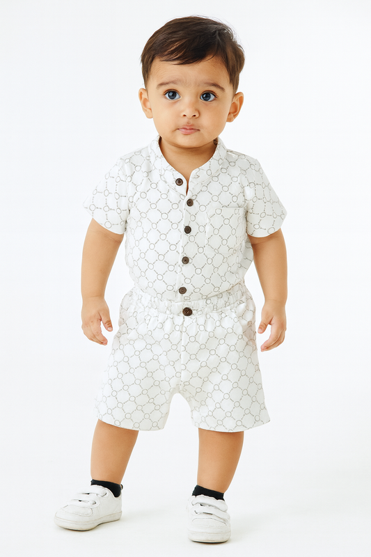 Stylish white printed co-ord set with buttoned shirt and comfy shorts for baby boys.