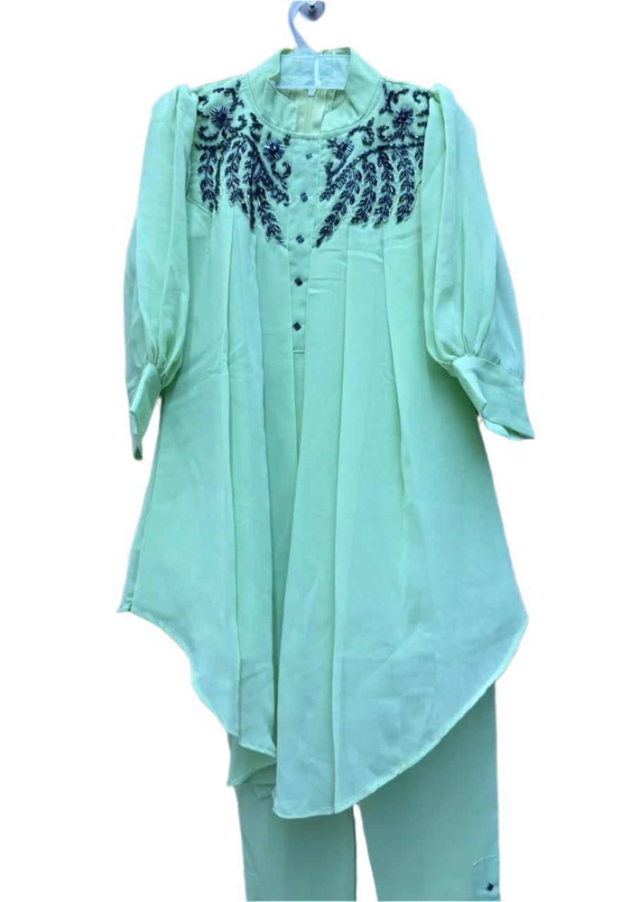 Stylish asymmetrical kurti and pant with hand-embroidered black thread and beadwork on the yoke