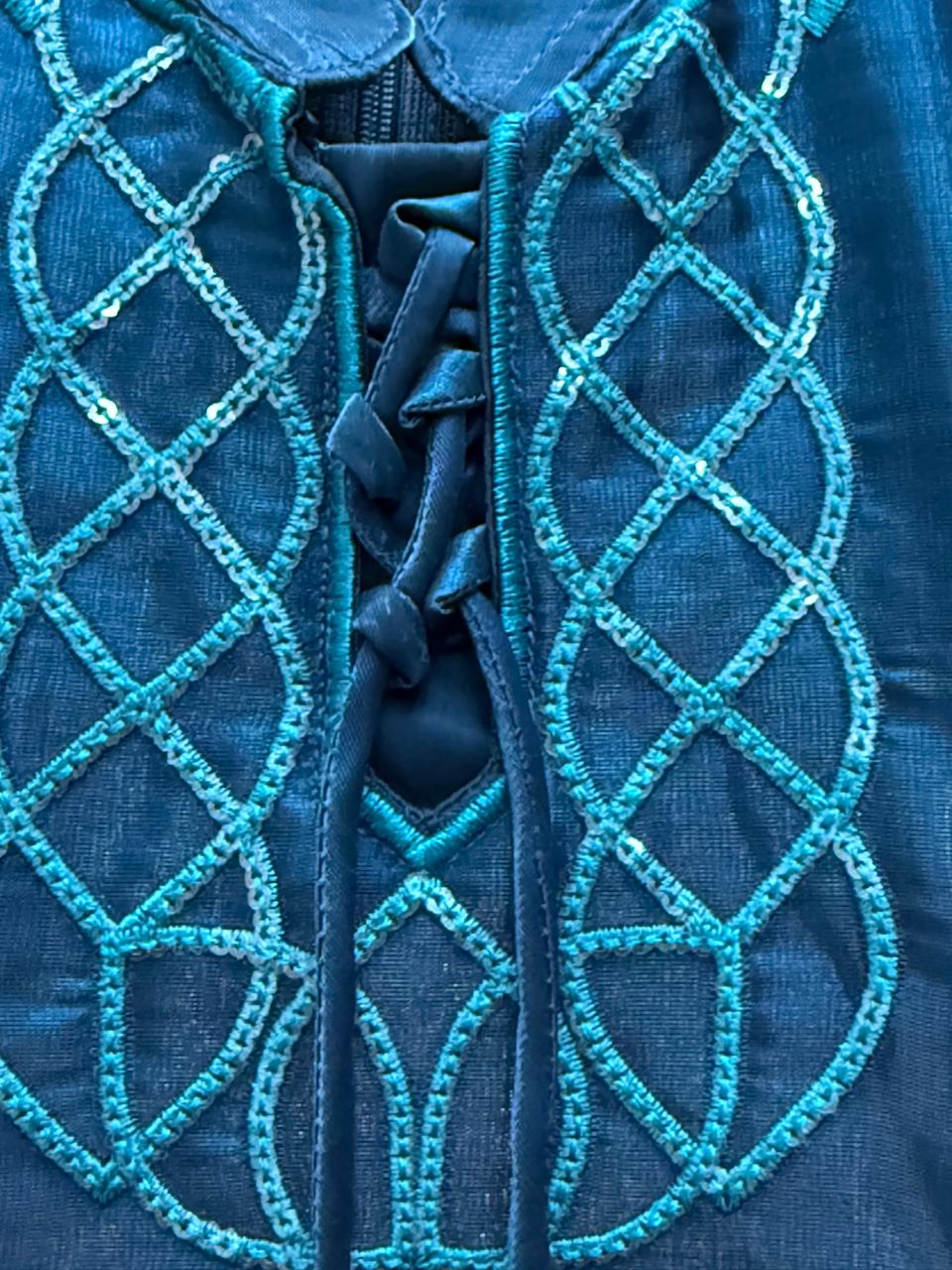 Elegant teal embroidered ethnic set perfect for festive occasions and celebrations.