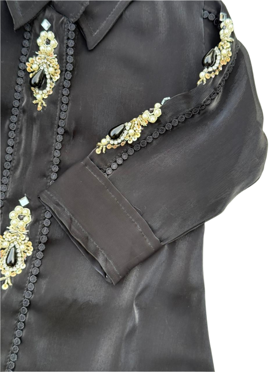 Regal black ethnic set with hand-embellished detailing—perfect for weddings, parties, and festive flair.