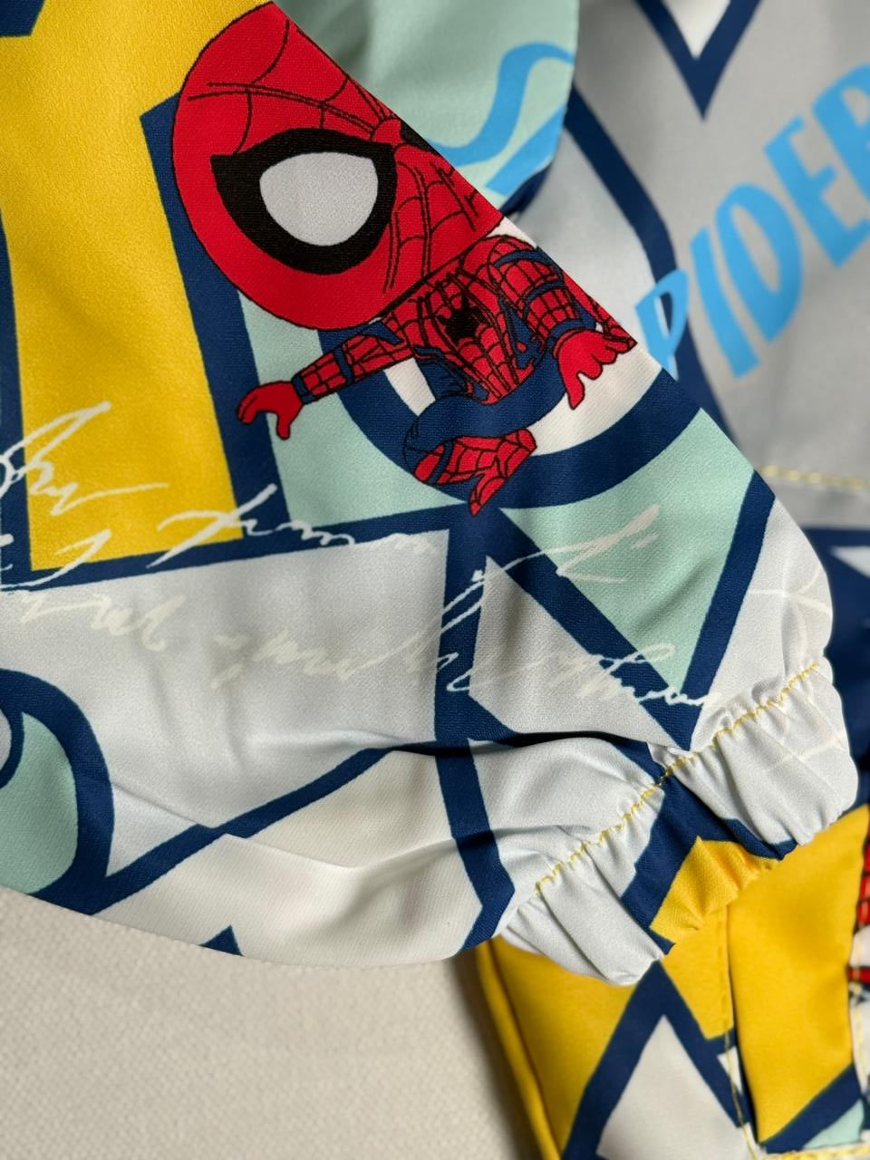 Vibrant Spider-Man kids jacket with hood, perfect for cozy superhero style.