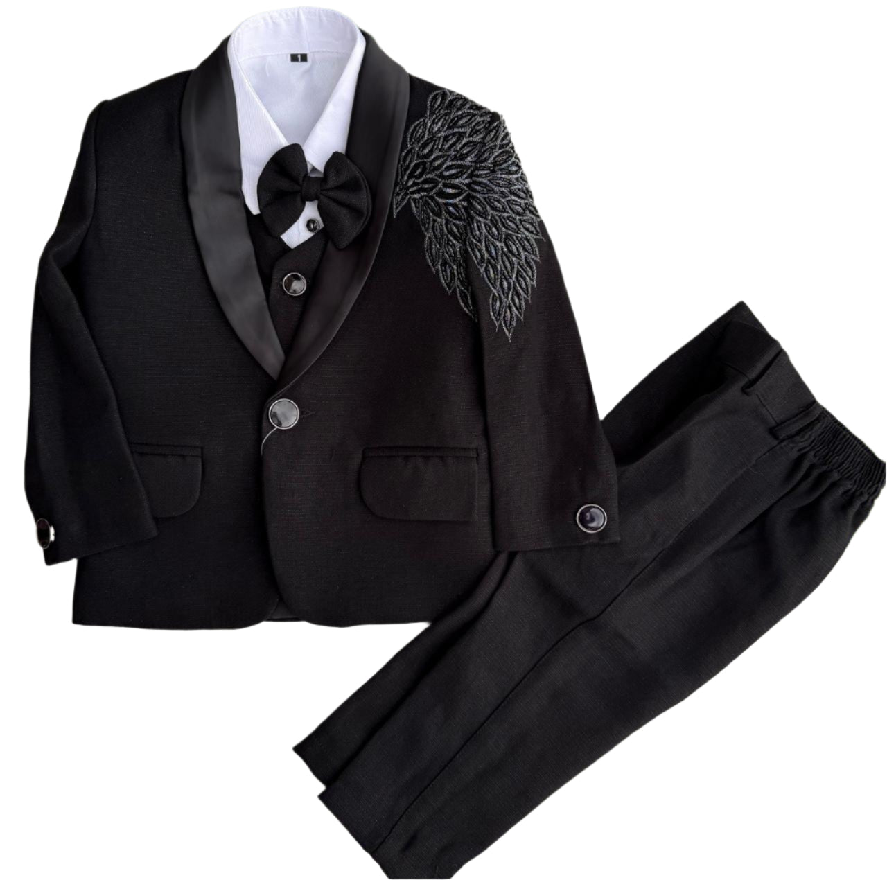 Premium black tuxedo with elegant embroidery – perfect for your little gentleman’s grand occasions.