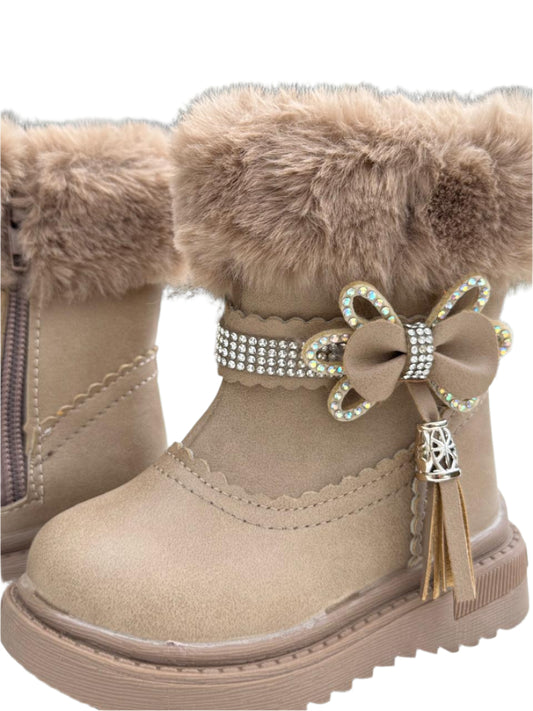 Elegant fur-lined winter boots with sparkling floral accents for cozy, stylish steps.