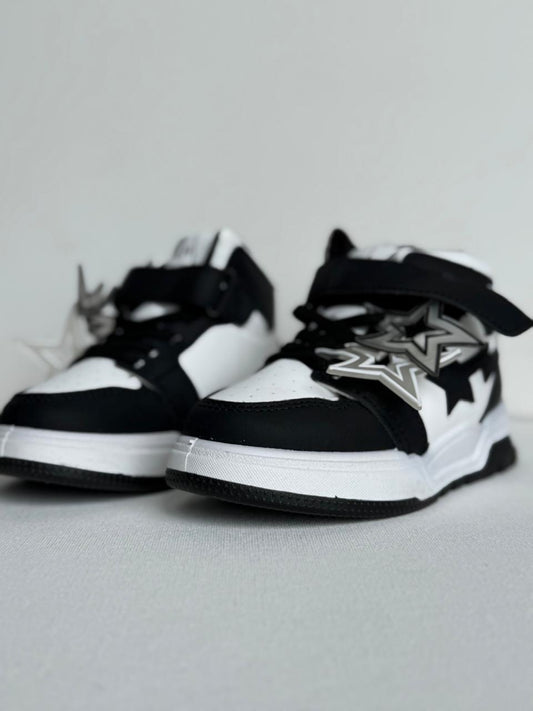"Starry style meets all-day comfort in these trendy kids’ sneakers."
