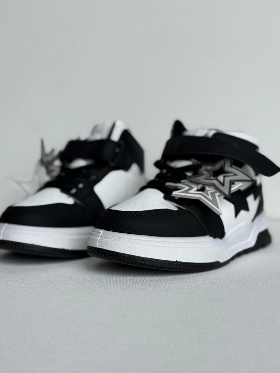 "Starry style meets all-day comfort in these trendy kids’ sneakers."