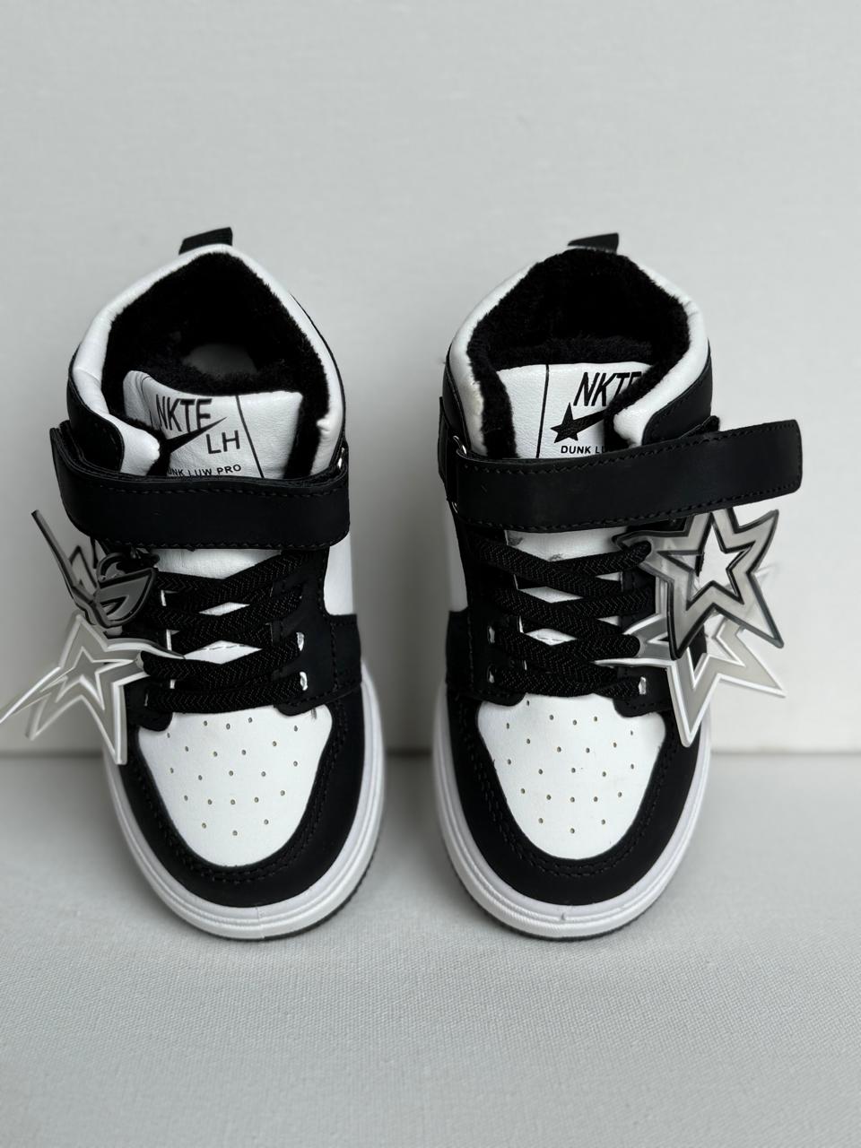 "Starry style meets all-day comfort in these trendy kids’ sneakers."