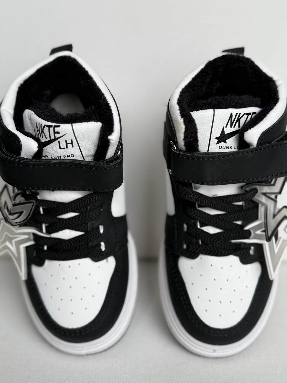 "Starry style meets all-day comfort in these trendy kids’ sneakers."