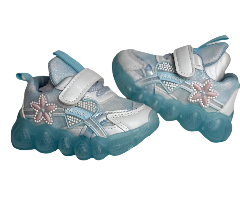"Step into style &amp; comfort with these adorable pastel blue kids’ sneakers!"