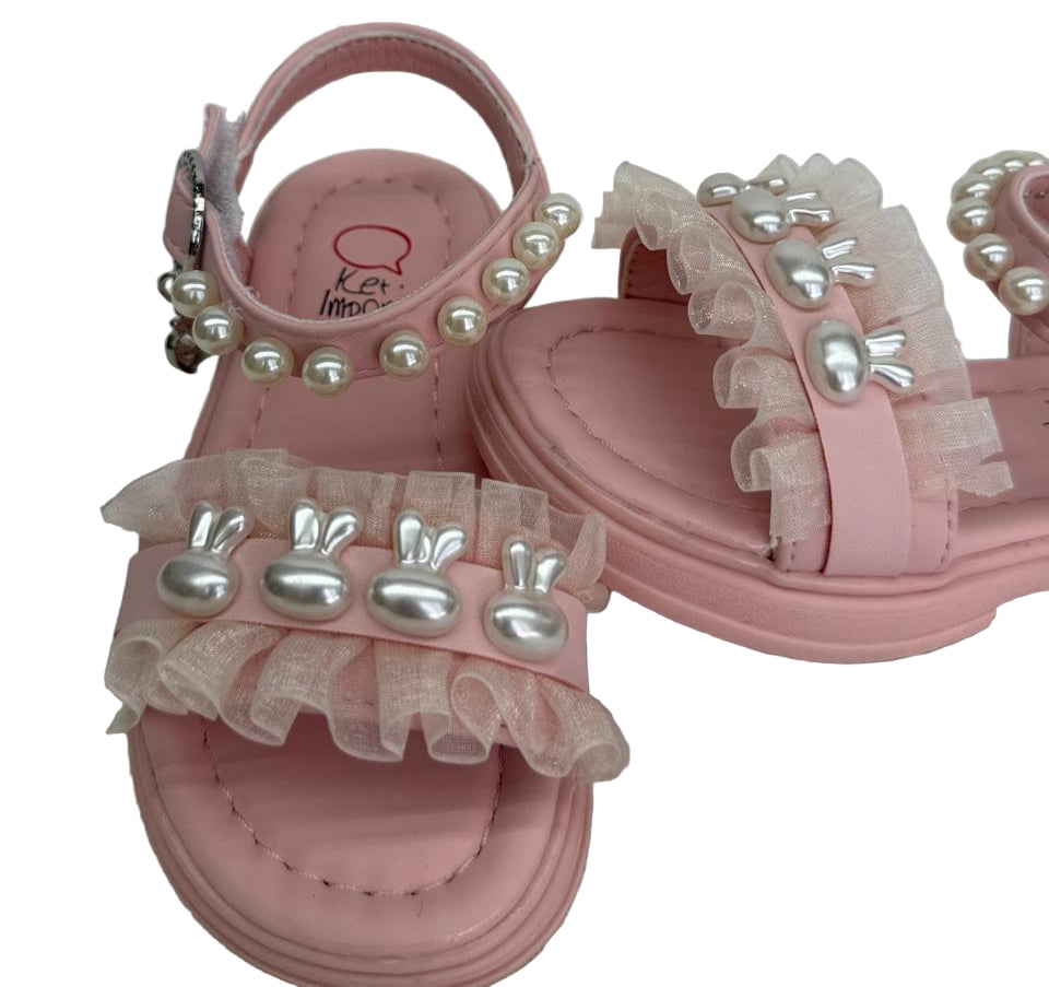 Step into cuteness with our pearl bunny ruffle sandals!"