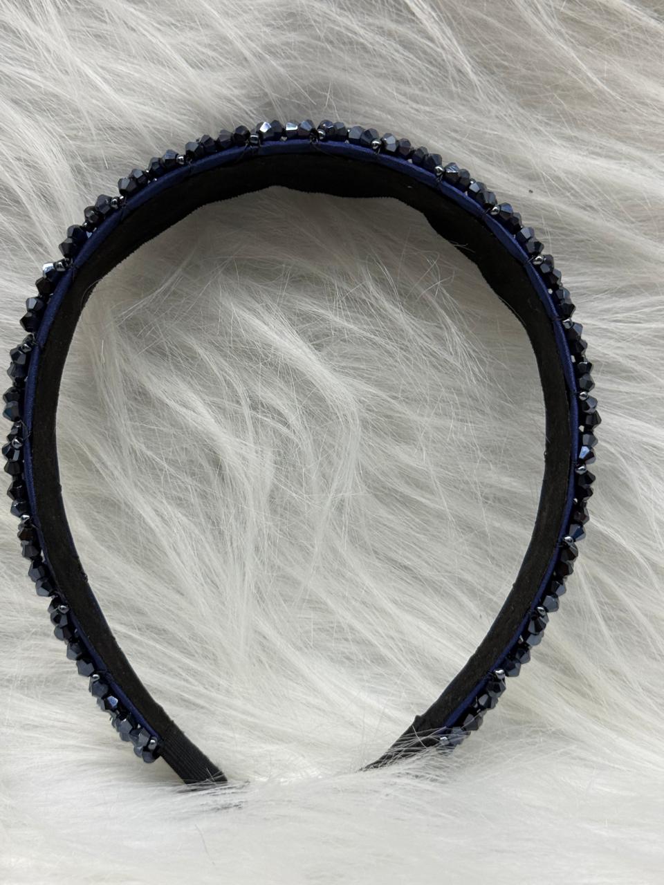 "Shine with elegance – a navy satin beaded headband that completes every look."