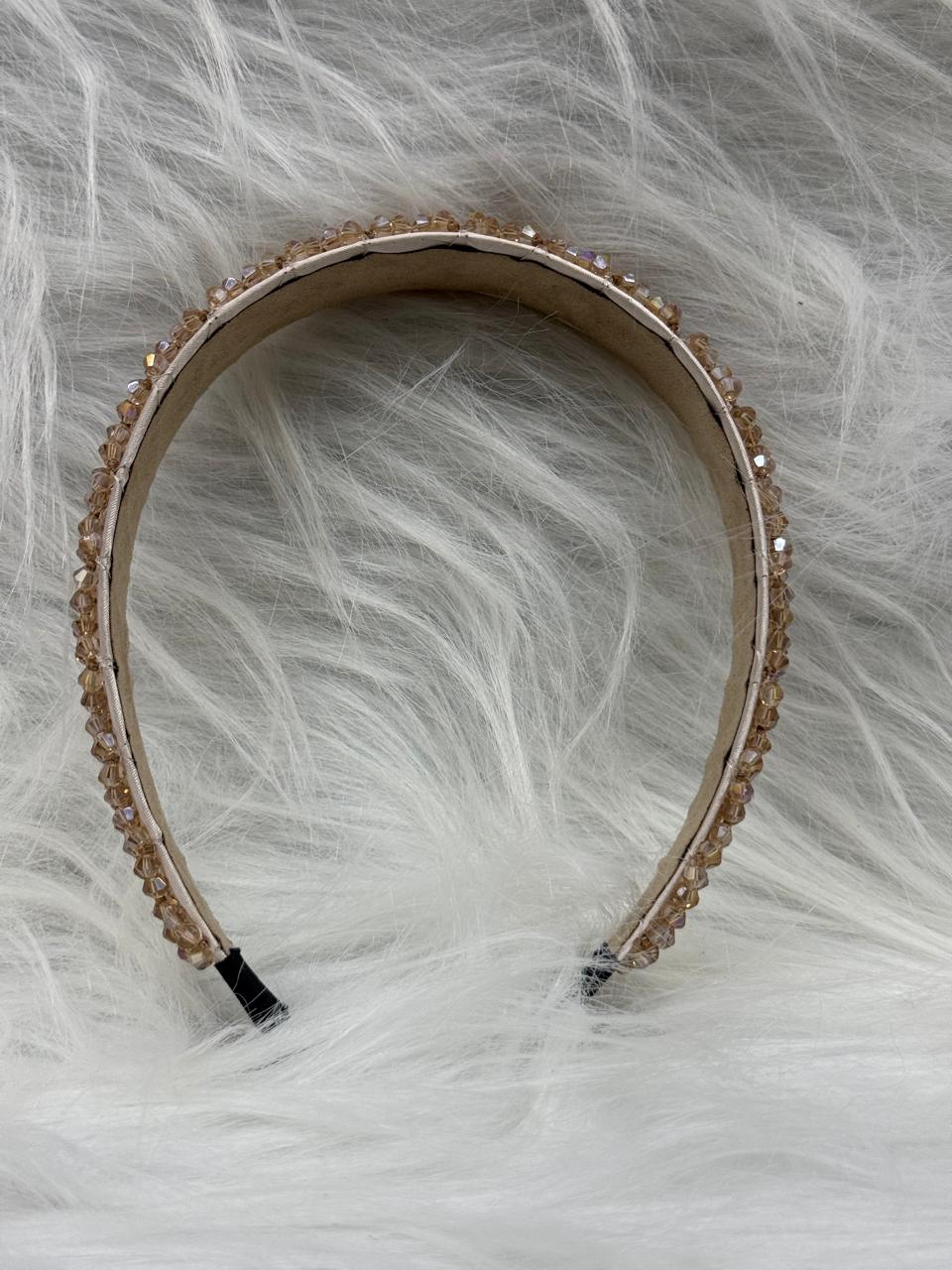 "Shine with elegance – a navy satin beaded headband that completes every look."