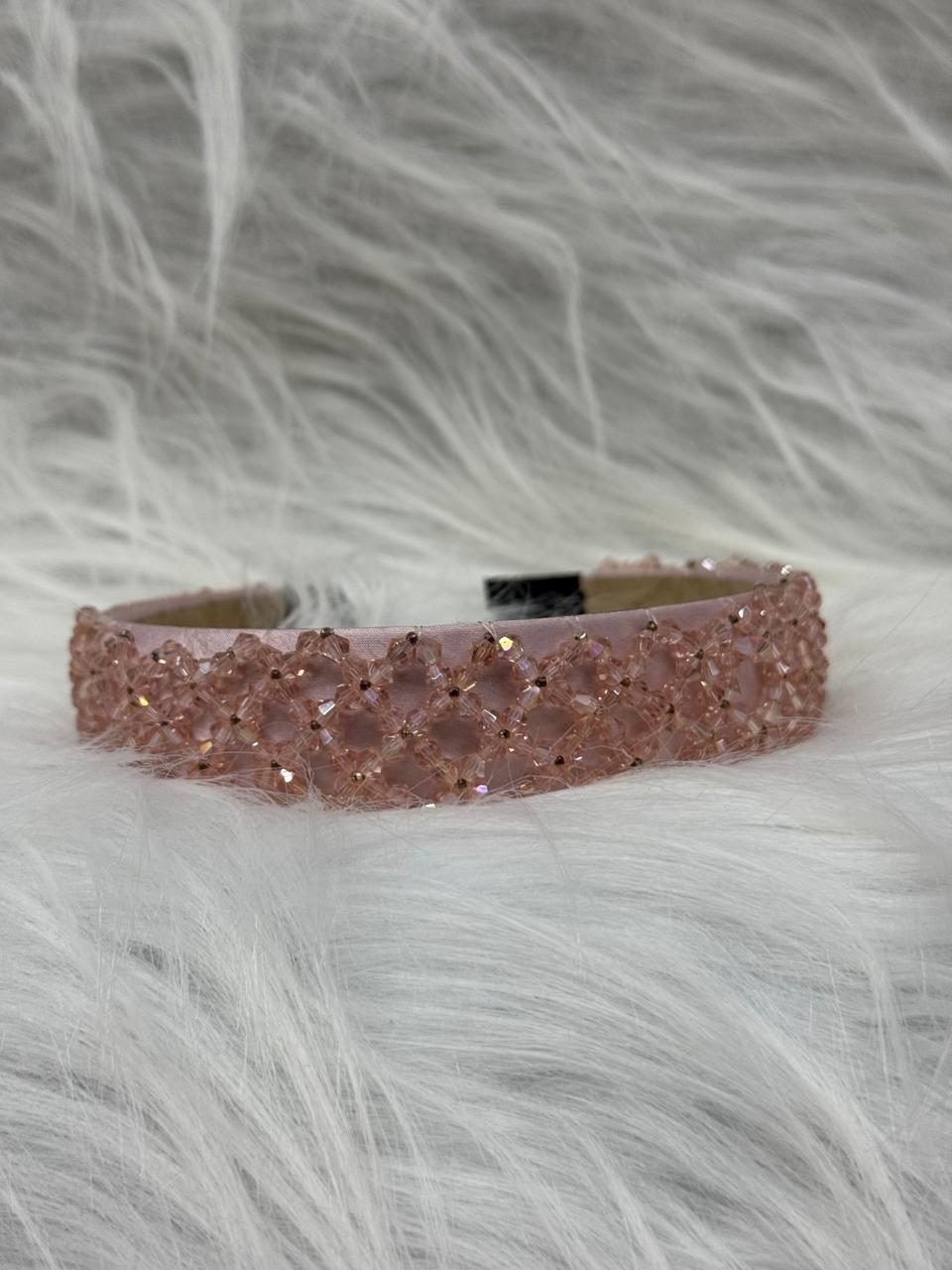 "Shine with elegance – a navy satin beaded headband that completes every look."
