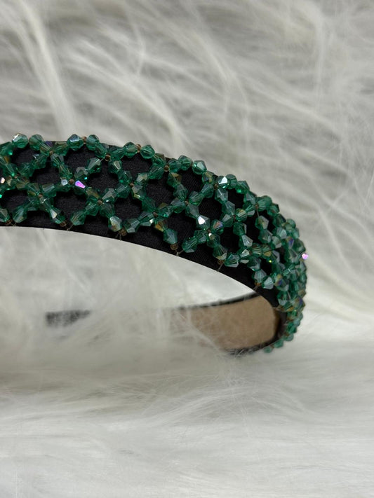 "Shine with elegance – a navy satin beaded headband that completes every look."