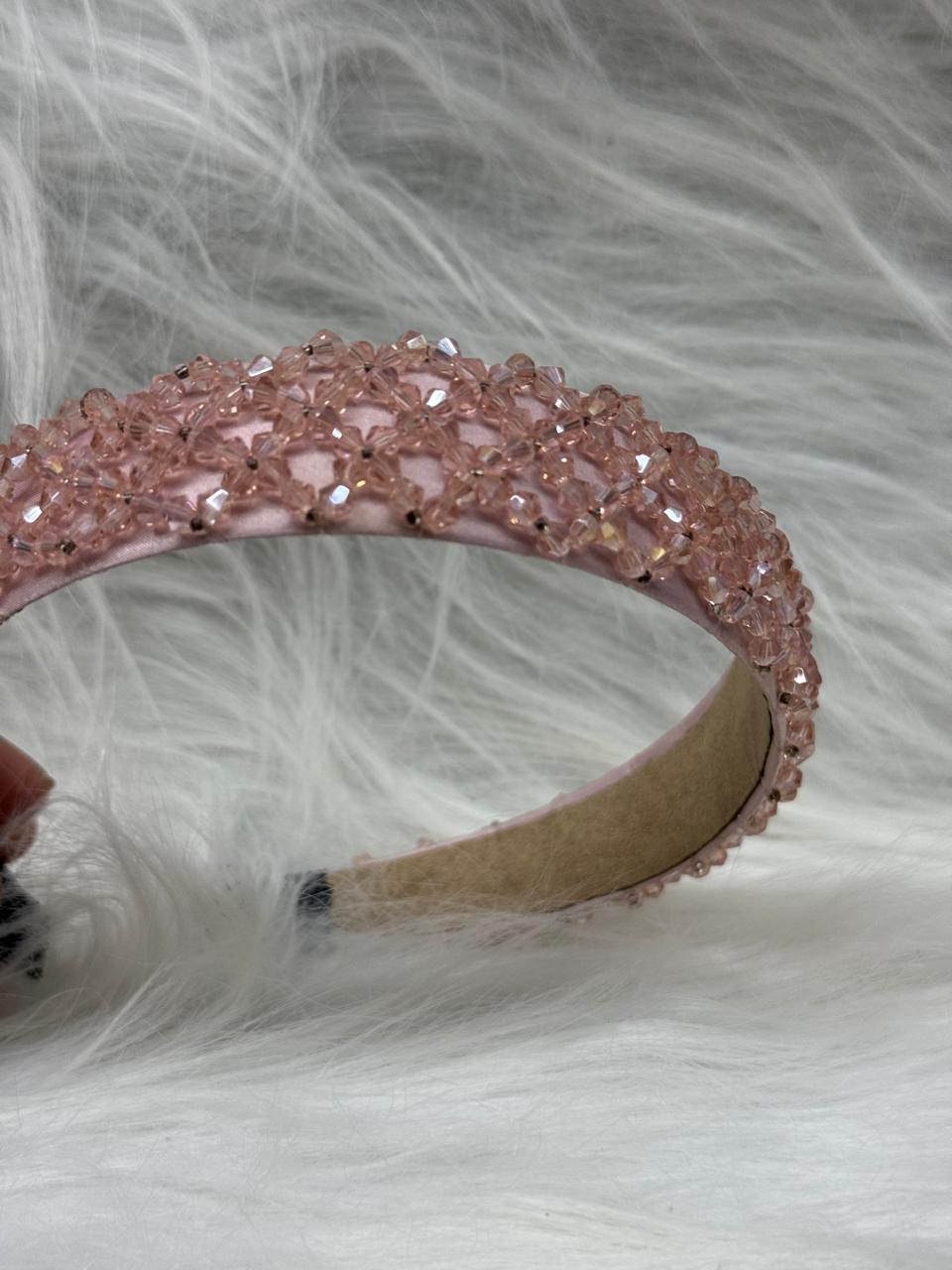 "Shine with elegance – a navy satin beaded headband that completes every look."