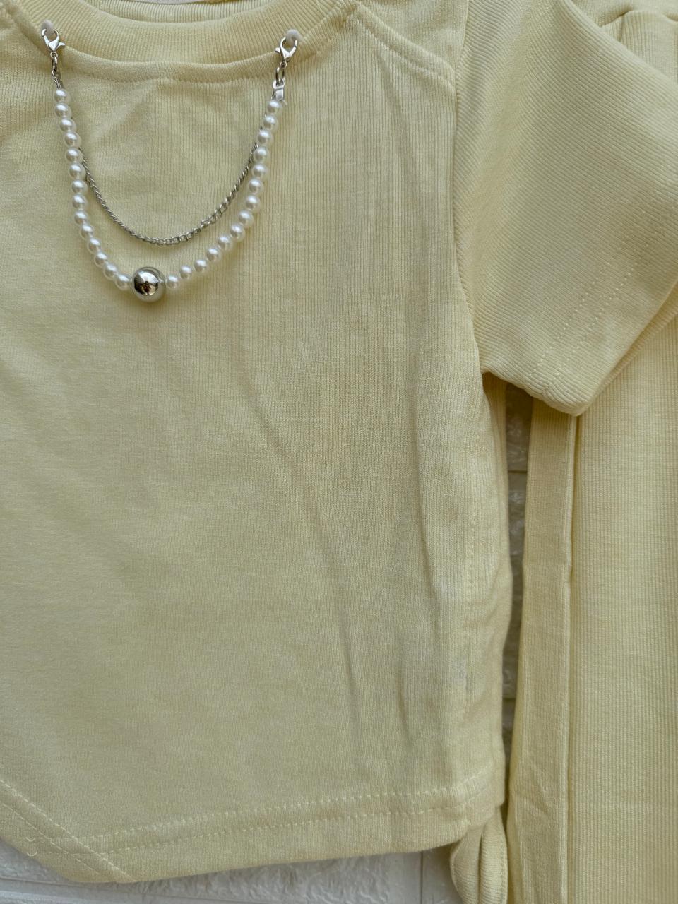 Keep your little one looking stylish and comfy with this adorable two-piece outfit!