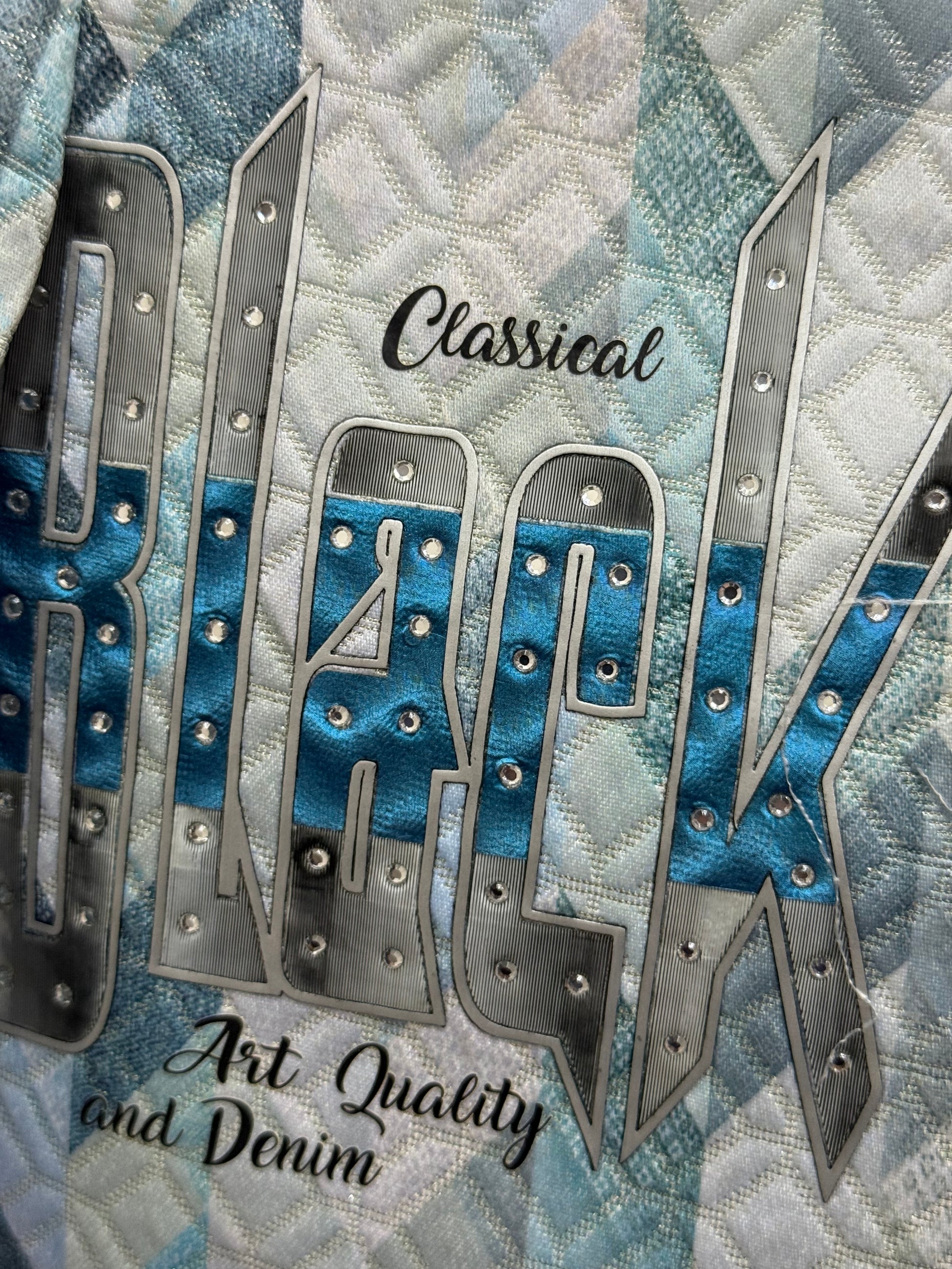 Blazer: Stylish light blue geometric print blazer with bold "Black Stone" graphic,