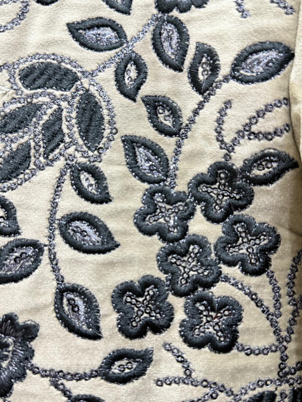 Elegant off-white embroidered sherwani with black trousers