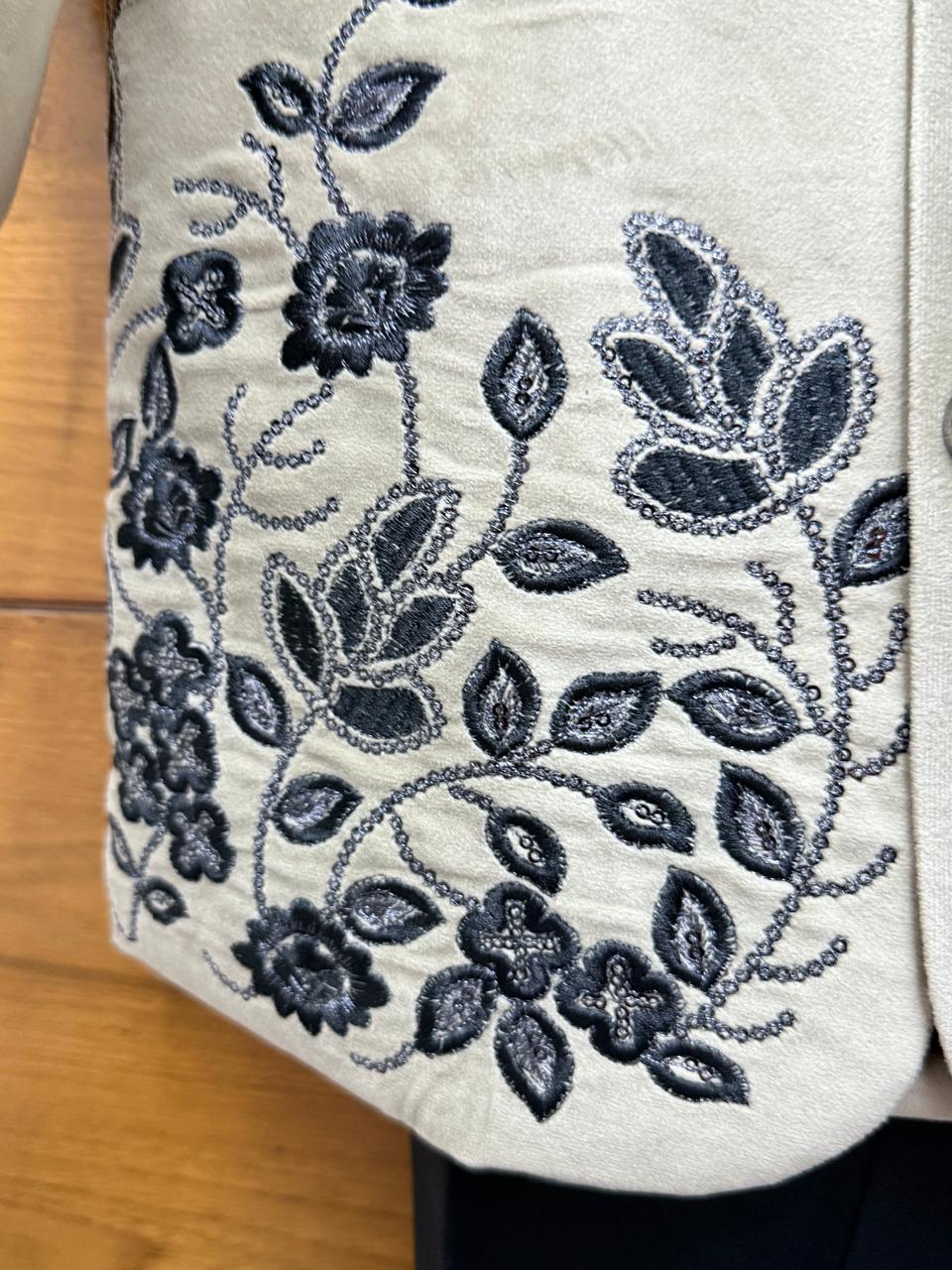 Elegant off-white embroidered sherwani with black trousers