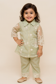 Elegant sage green embroidered set with pearl accents and lace-detailed pants and dupatta.