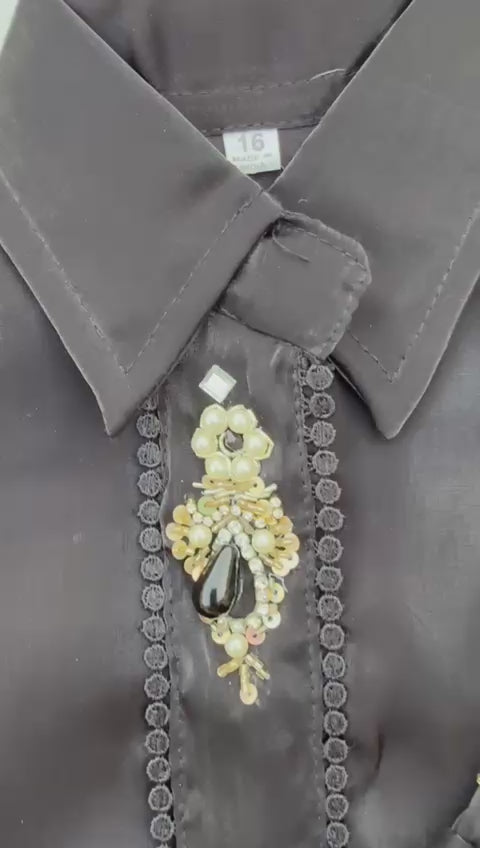 Regal black ethnic set with hand-embellished detailing—perfect for weddings, parties, and festive flair.