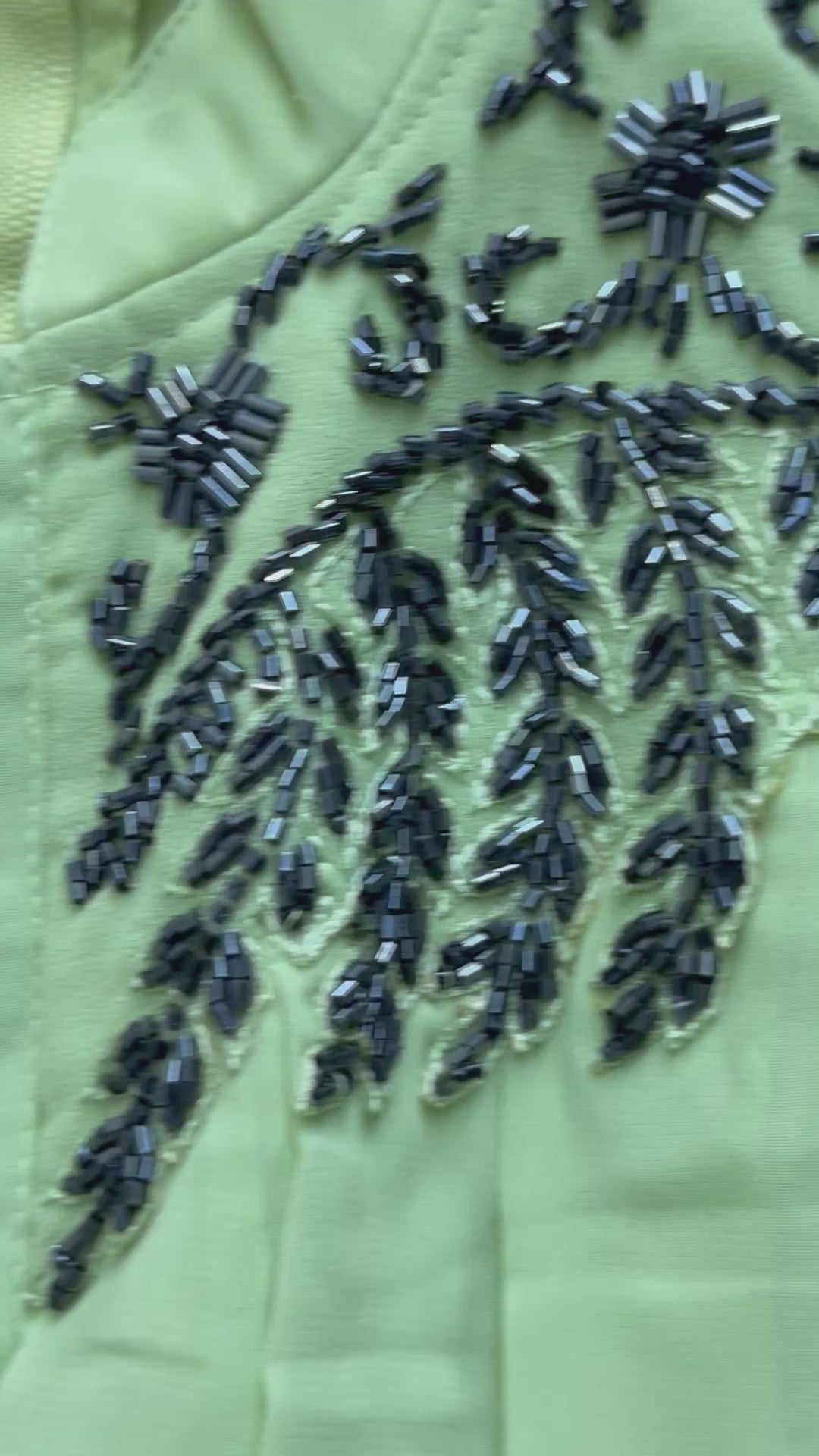 Load video: Stylish asymmetrical kurti and pant with hand-embroidered black thread and beadwork on the yoke