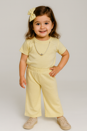 Keep your little one looking stylish and comfy with this adorable two-piece outfit!